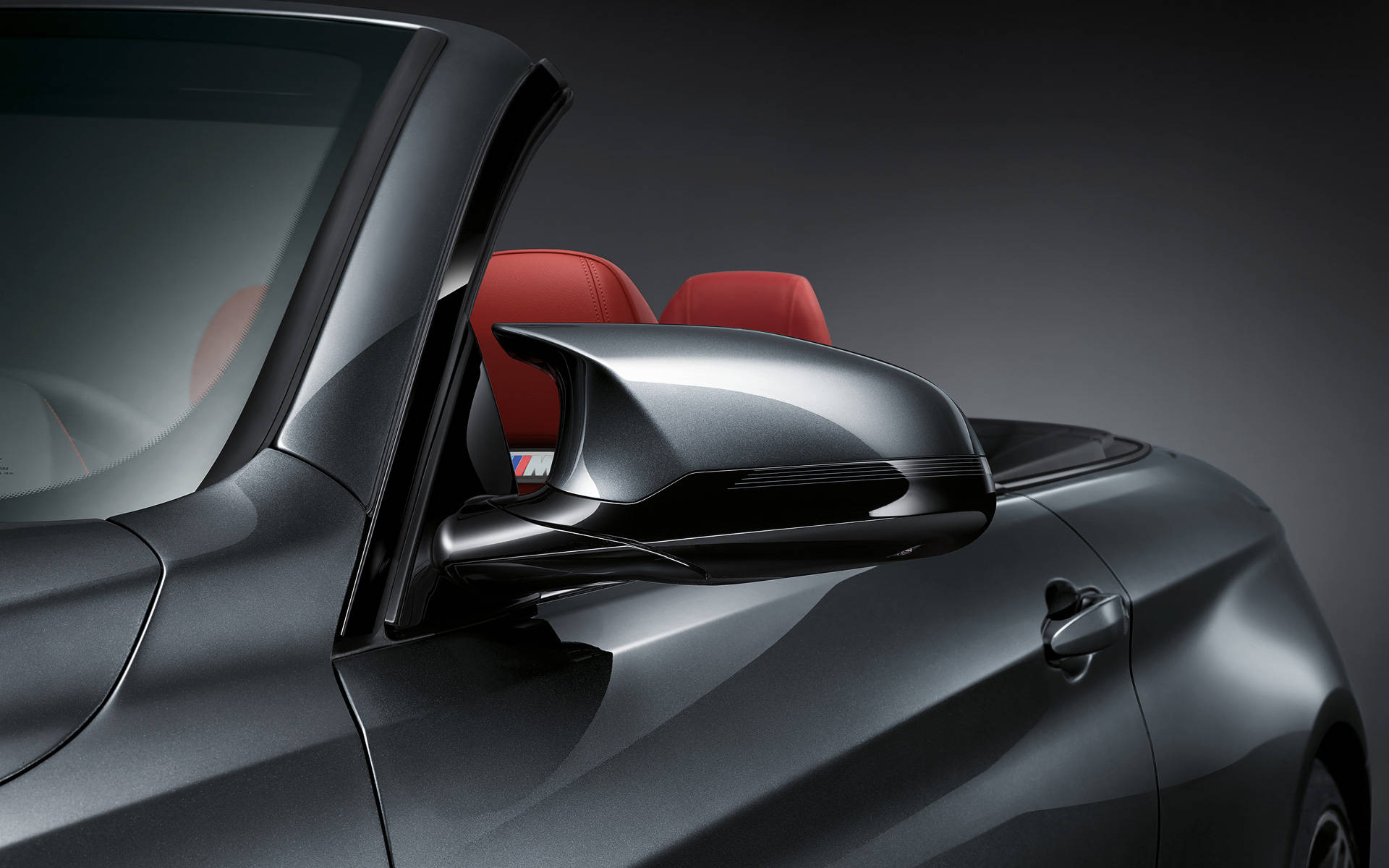 BMW M4 Convertible Drivers Side Mirror Front Angle BMW M4 Convertible Drivers Side Mirror Front Angle
